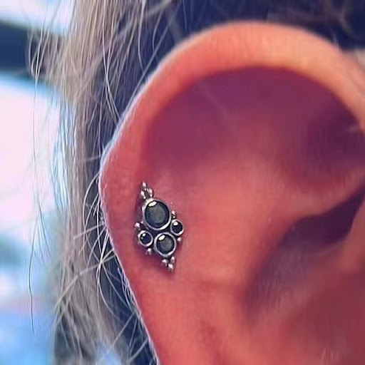 Explore sea shell tattoo ideas, creative tattoo ideas in Orange, available at Baron Art Tattoo