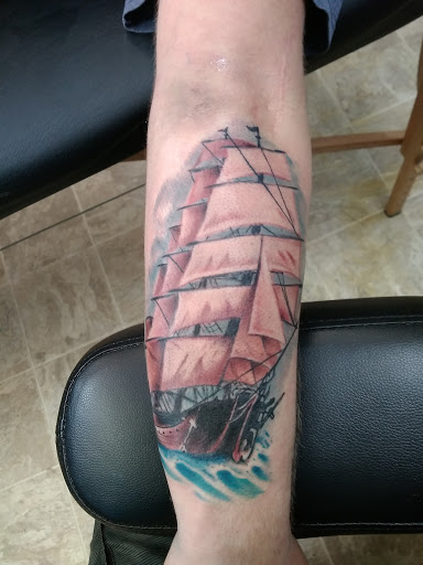 Explore reading tattoo ideas, creative tattoo ideas in Leesville, available at Integrity Tattoo