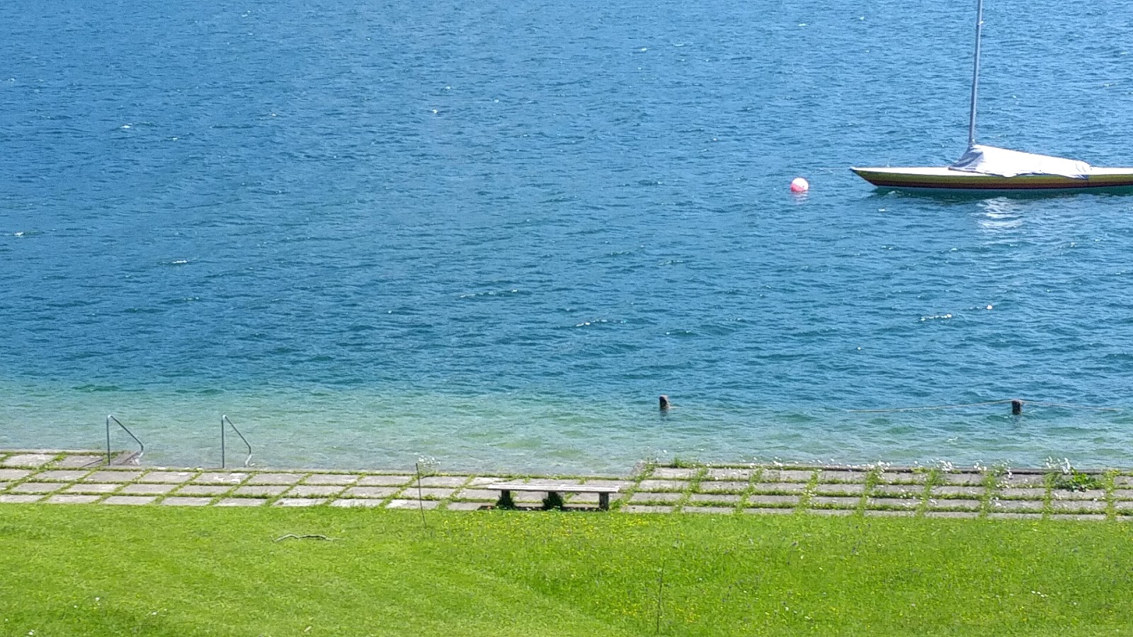 Foto van Grieblinger Strand met turquoise puur water oppervlakte