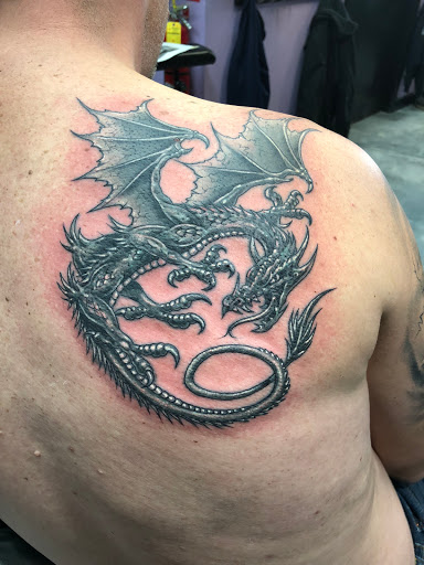 Explore inside lip tattoo ideas, creative tattoo ideas in Deerfield, available at Maximum Tattoo