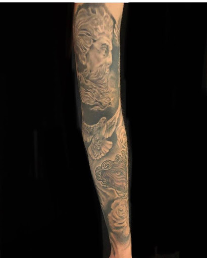 Explore badass mens tattoo ideas, creative tattoo ideas in Twin Falls, available at Black Rose Tattoo