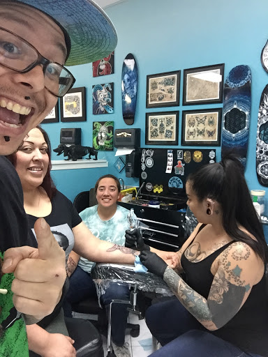 Explore ghost band tattoo ideas, creative tattoo ideas in Murrieta, available at Diamond City Tattoo & Piercing