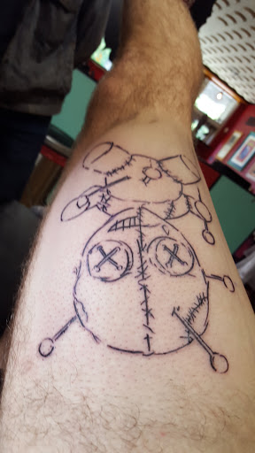 Explore inside ear tattoos ideas, creative tattoo ideas in Shreveport, available at The Body Electric