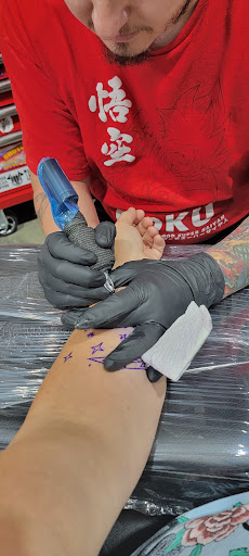 Explore charizard tattoo ideas, creative tattoo ideas in Wills Point, available at Tattanium Studios