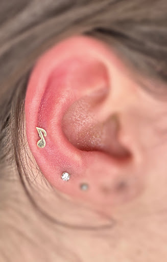 Explore tattoo ideas for shoulder cap, creative tattoo ideas in Scottsdale, available at Club Tattoo