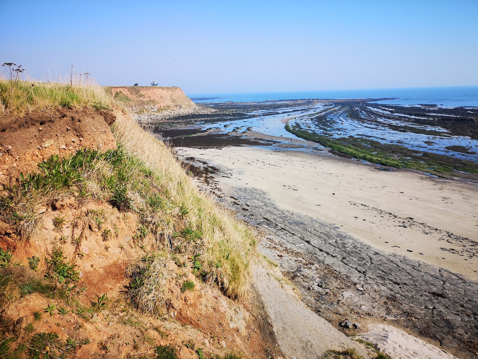 Photo de Spittal Beach avec l'eau cristalline de surface