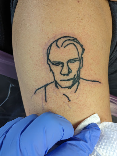 Explore tattoo ideas for men neck, creative tattoo ideas in East Rochester, available at Spice City Tattoo