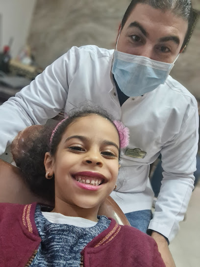 عيادات الأسنان التخصصية توب كلينك - دكتور محمد عبد الغني
