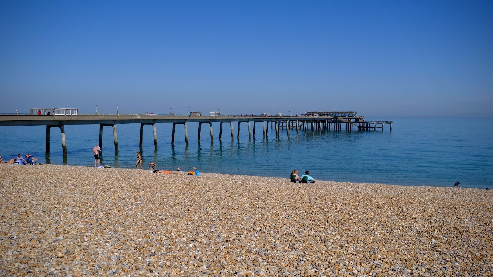 Photo of Deal Castle beach with blue pure water surface