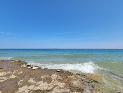 Zdjęcie Fossil Ledges Beach z powierzchnią turkusowa czysta woda