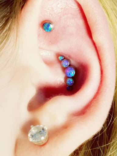 Explore dragon age tattoo ideas, creative tattoo ideas in Chapel Hill, available at Golden Falcon Tattoo and Piercing