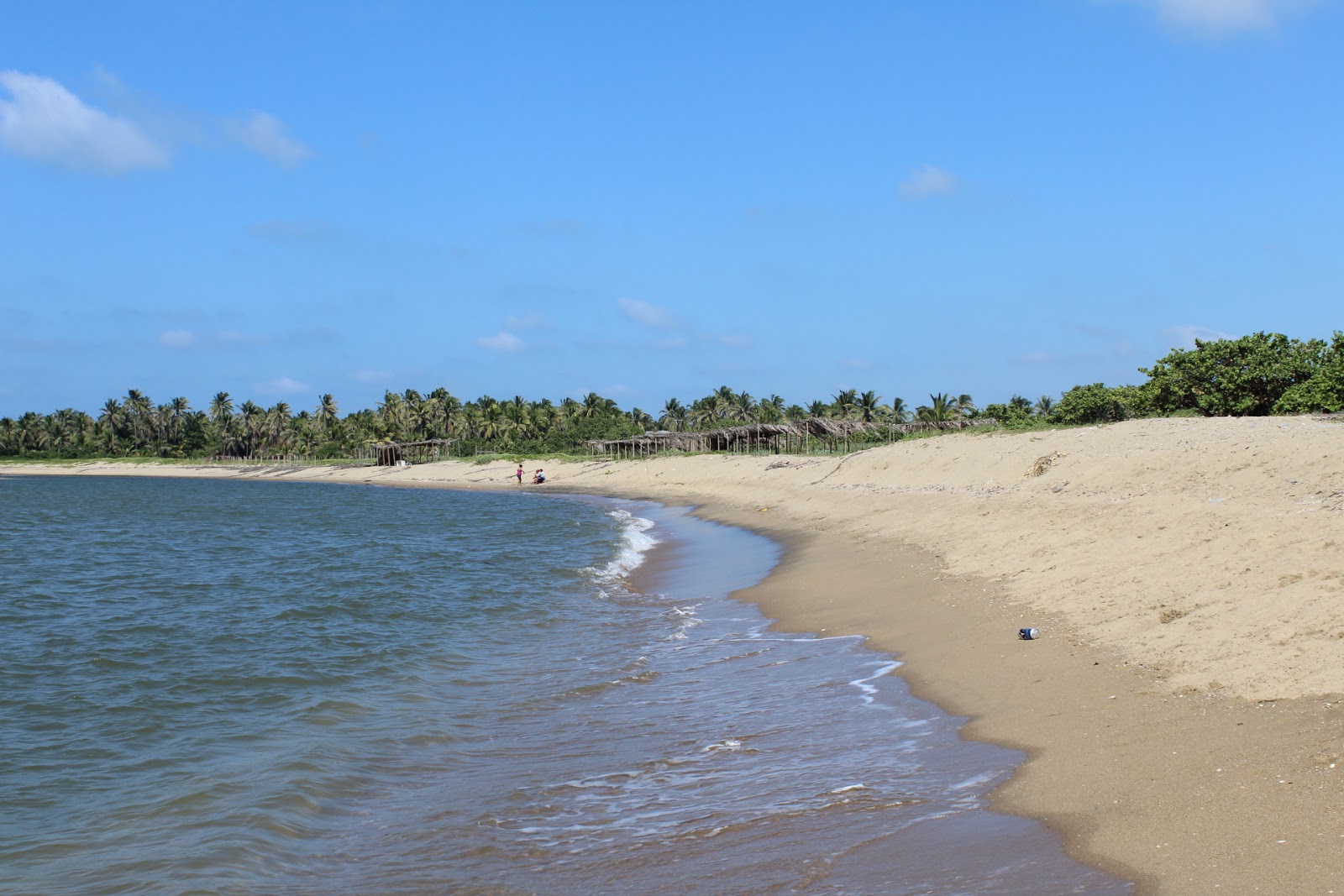 Fotografija Playa Acapulquito z svetel pesek površino