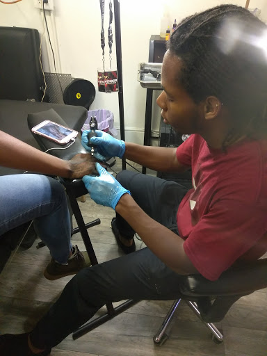 Explore lioness tattoo ideas for females, creative tattoo ideas in Atlanta, available at Iron Palm Tattoos & Body Piercing Atlanta