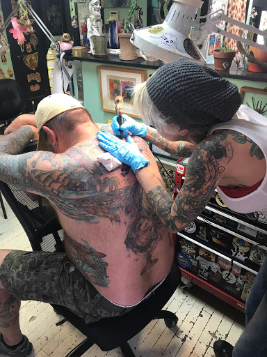 Explore scene tattoo ideas, creative tattoo ideas in Austin, available at Moms Tattoos