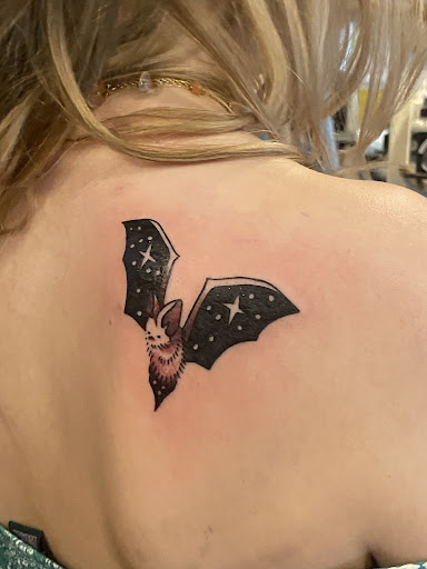 Explore smile tattoo ideas, creative tattoo ideas in Steamboat Springs, available at Black Rabbit Tattoo