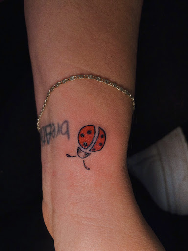 Explore mom and daughter tattoos ideas, creative tattoo ideas in North Tonawanda, available at Dark Side Ink Tattoo Studio