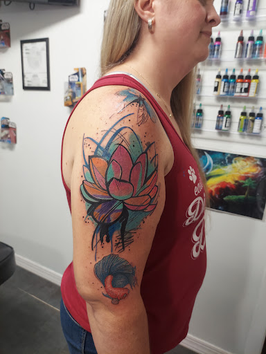 Explore dog outline tattoo ideas, creative tattoo ideas in Zephyrhills, available at Lions Den Tattoo Company