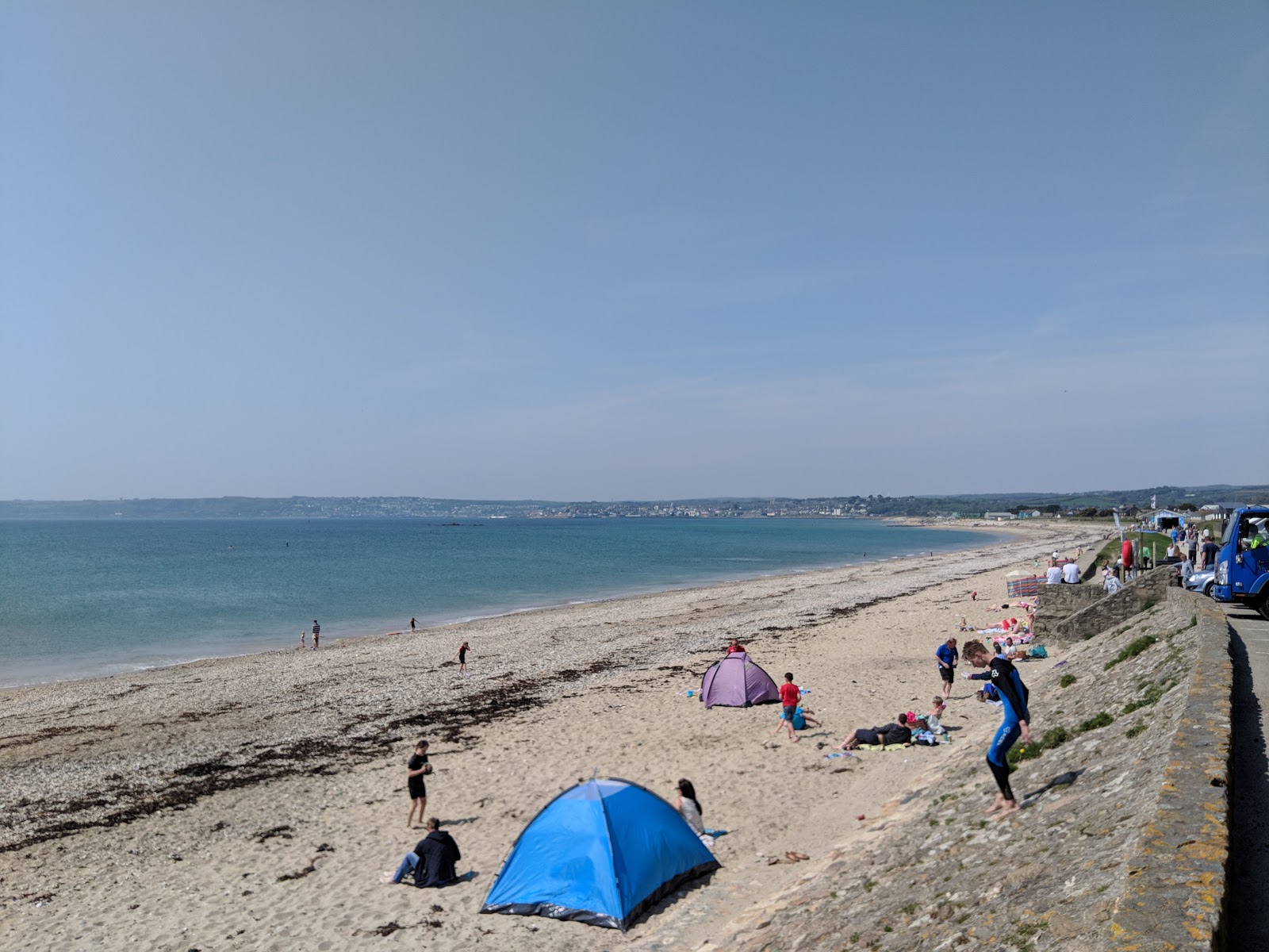 Fotografie cu Plaja Marazion Marsh cu o suprafață de apa pură turcoaz