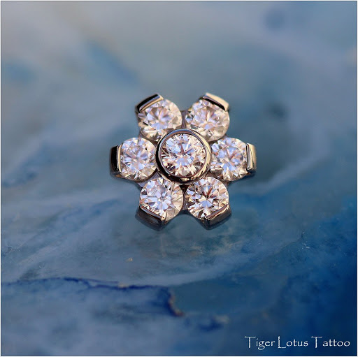 Explore family tattoo ideas men, creative tattoo ideas in Fort Myers, available at Tiger Lotus Tattoo and Piercing