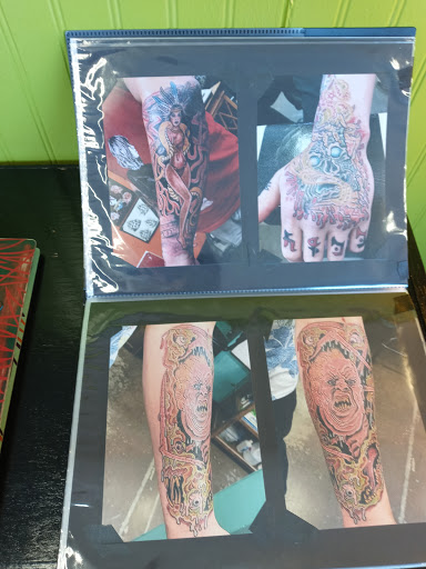 Find arm half sleeve tattoo ideas for your next unique tattoo in Everett at Tattoosmith & Company