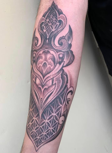 Explore arm sleeve tattoo ideas for females, creative tattoo ideas in Saint Petersburg, available at Buku Tattoo Studio