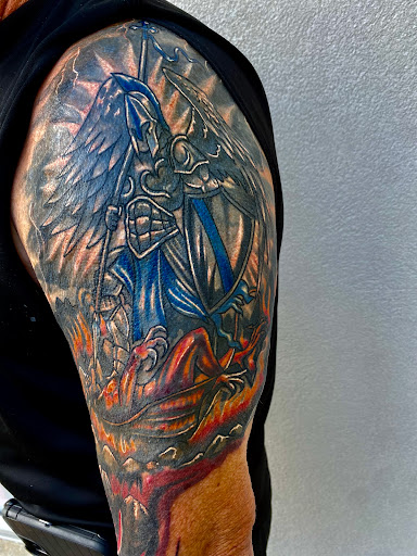 Explore man leg tattoo ideas, creative tattoo ideas in Conroe, available at Nicoles Tattoos and Piercings