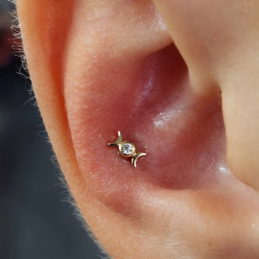 Explore shoulder tribal tattoo ideas, creative tattoo ideas in Great Falls, available at Three Moons Body Shop