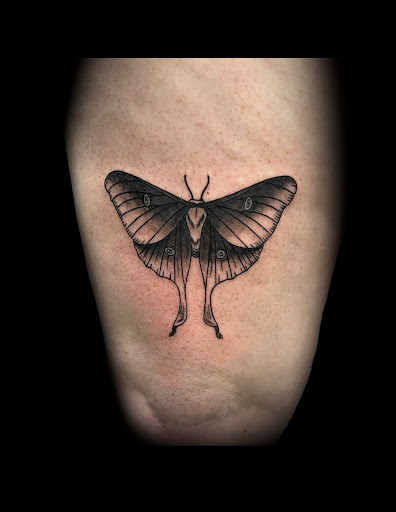 Explore dragon tattoo ideas for women, creative tattoo ideas in Foley, available at Symbolic Ink Tattoo Studio