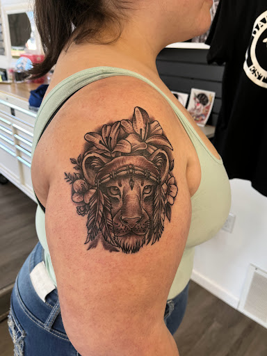Explore tattoos tramp stamp ideas, creative tattoo ideas in Belleville, available at Dark Horse Tattoo Company, LLC
