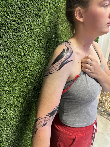 Explore let it go tattoo ideas, creative tattoo ideas in Cocoa, available at Rorschach Tattoo Shop and Piercing Studio