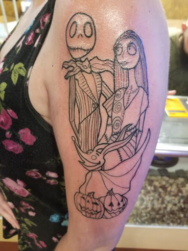 Explore dallas cowboy tattoo ideas, creative tattoo ideas in Orange City, available at Modern Elegance Tattoo & Body Piercing