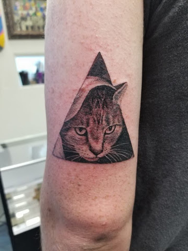 Explore bear paw tattoo ideas, creative tattoo ideas in Fort Myers, available at Tiger Lotus Tattoo and Piercing