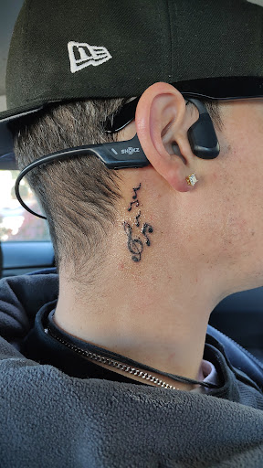 Explore small rose tattoo ideas, creative tattoo ideas in Greenville, available at Deep Liquid Ink