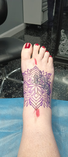 Explore ladies wrist tattoo ideas, creative tattoo ideas in Fort Myers, available at Loyal 2 The Coil Tattoos & Piercings (Edison Mall Location Entrance F)