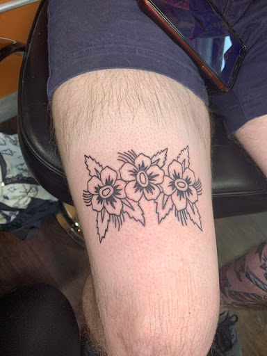 Explore elbow tattoo ideas men, creative tattoo ideas in Williamston, available at Inkd Tattoo Parlor