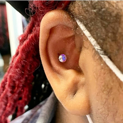 Explore black cat tattoo ideas, creative tattoo ideas in North Charleston, available at Exotic Impressions Body Piercing