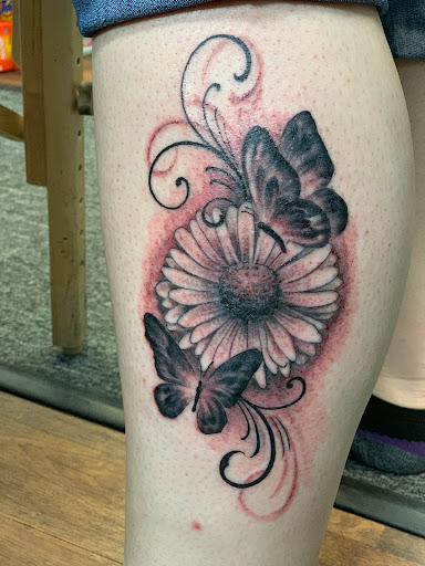 Explore neck tattoo men ideas, creative tattoo ideas in Midvale, available at Aloha Tattoos - Award-Winning Utah Ink