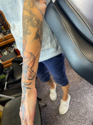 Explore name placement tattoo ideas, creative tattoo ideas in Sarasota, available at Z-Edge Tattoo and Body Piercing North Shop