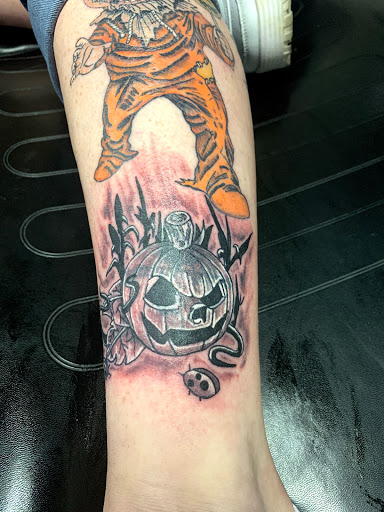 Explore good back tattoo ideas, creative tattoo ideas in Hudson Falls, available at ALTERED ADDICTION TATTOOS