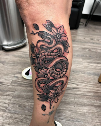 Explore traditional elbow tattoo ideas, creative tattoo ideas in Edmond, available at The Tattoo Shop Edmond