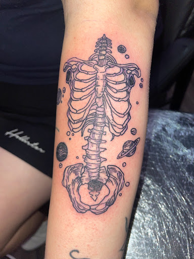 Explore cover up tattoo ideas for lower back, creative tattoo ideas in Orange Park, available at Big City Tattoo and Piercing