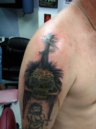 Find sword tattoo ideas for your next unique tattoo in Ormond Beach at Tropical Tattoo Inc