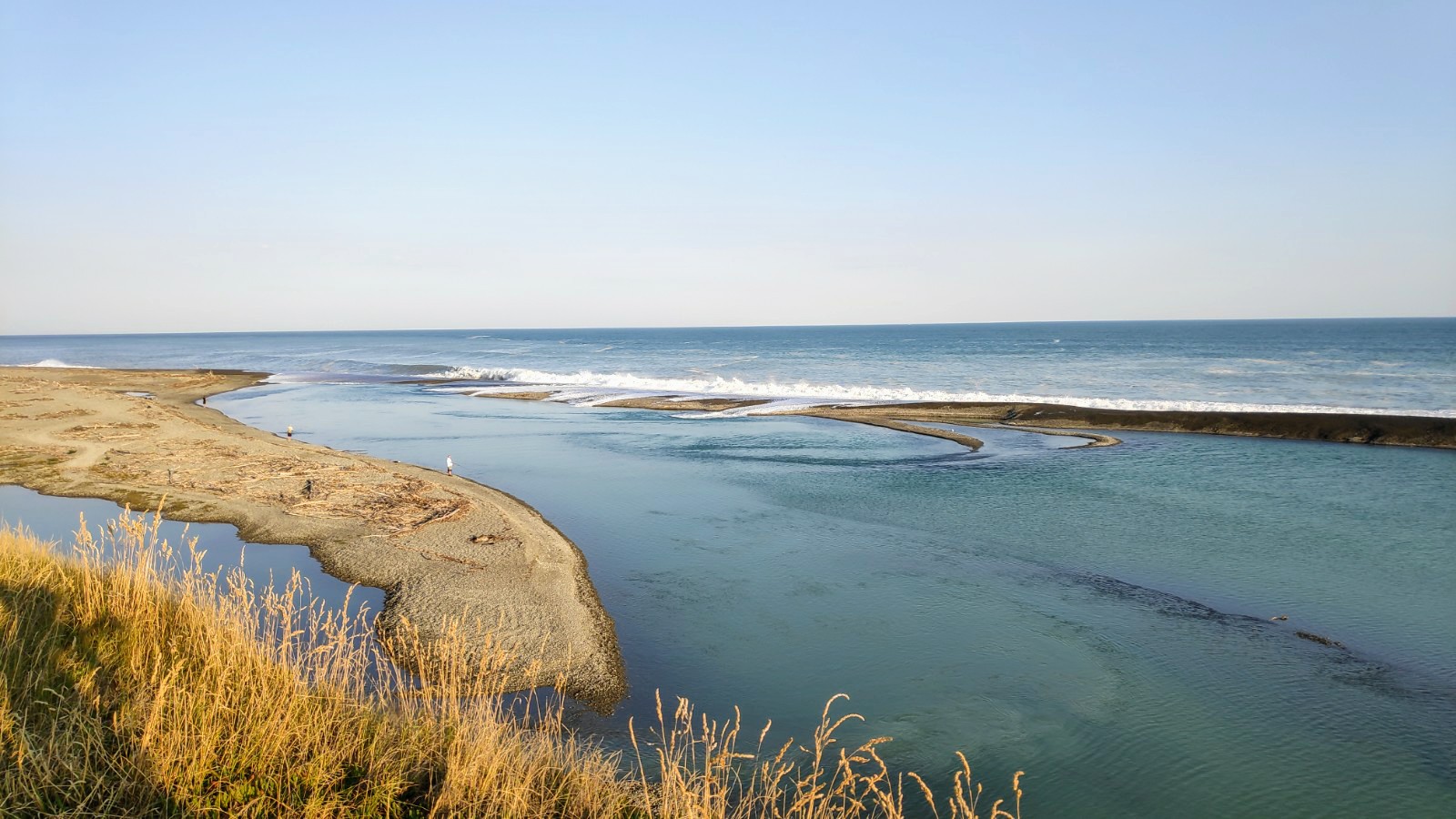Foto van Wakanui Beach met turquoise water oppervlakte