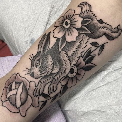 Explore female elbow tattoo ideas, creative tattoo ideas in Boston, available at Good Faith Tattoos