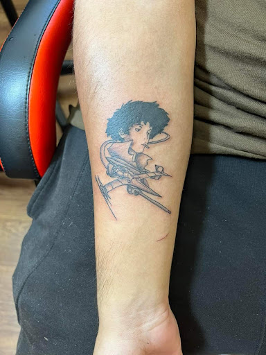 Explore forearm cross tattoo ideas, creative tattoo ideas in London, available at Ink Tactician LLC