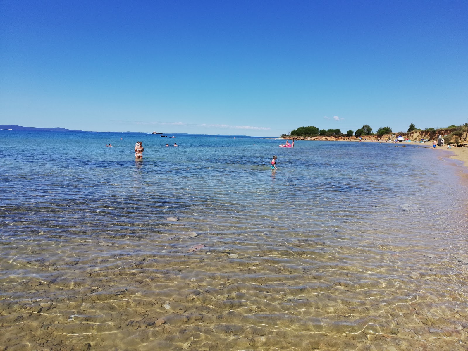 Foto di Bilotinjak beach - luogo popolare tra gli intenditori del relax