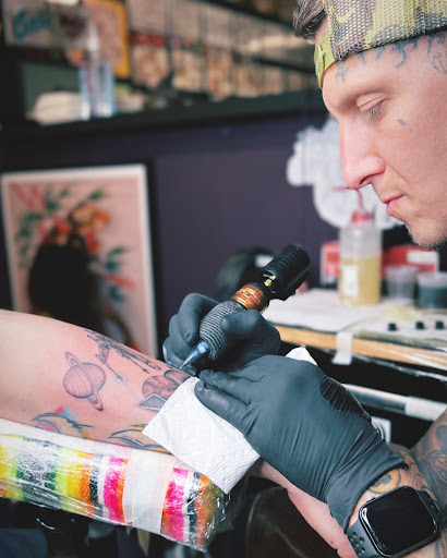 Explore flower spine tattoo ideas, creative tattoo ideas in Georgetown, available at Iron Rite Tattoo South