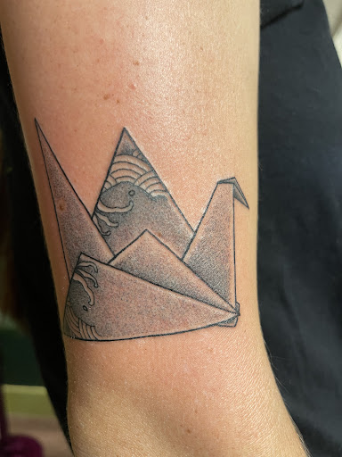 Explore softball tattoo ideas, creative tattoo ideas in Savannah, available at Tramp Art Studios