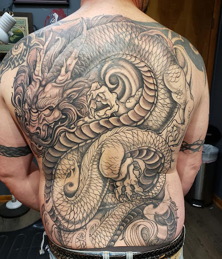 Explore roman numeral tattoo ideas, creative tattoo ideas in Johnson City, available at Defiant Designs