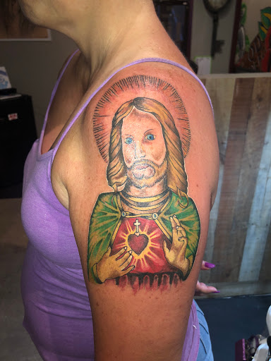 Explore tattoo ideas for losing a brother, creative tattoo ideas in Cape Coral, available at UNRIVALED INK